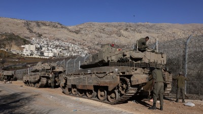 آليات إسرائيلية في المنطقة العازلة عند هضبة الجولان السوري المحتل (afp)_0